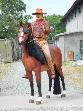 model 2143 john wayne cowboy on a horse life size